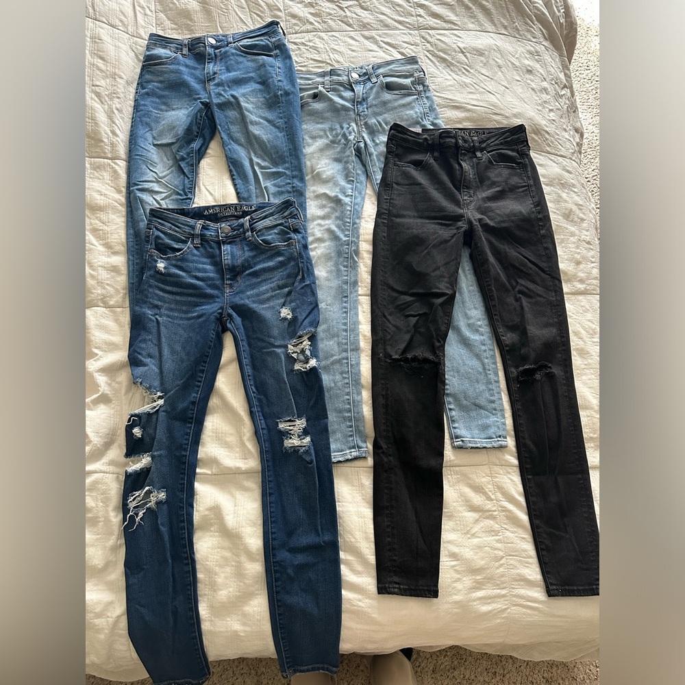 4 pairs of Women’s American Eagle jeans. All jeans are size 2.